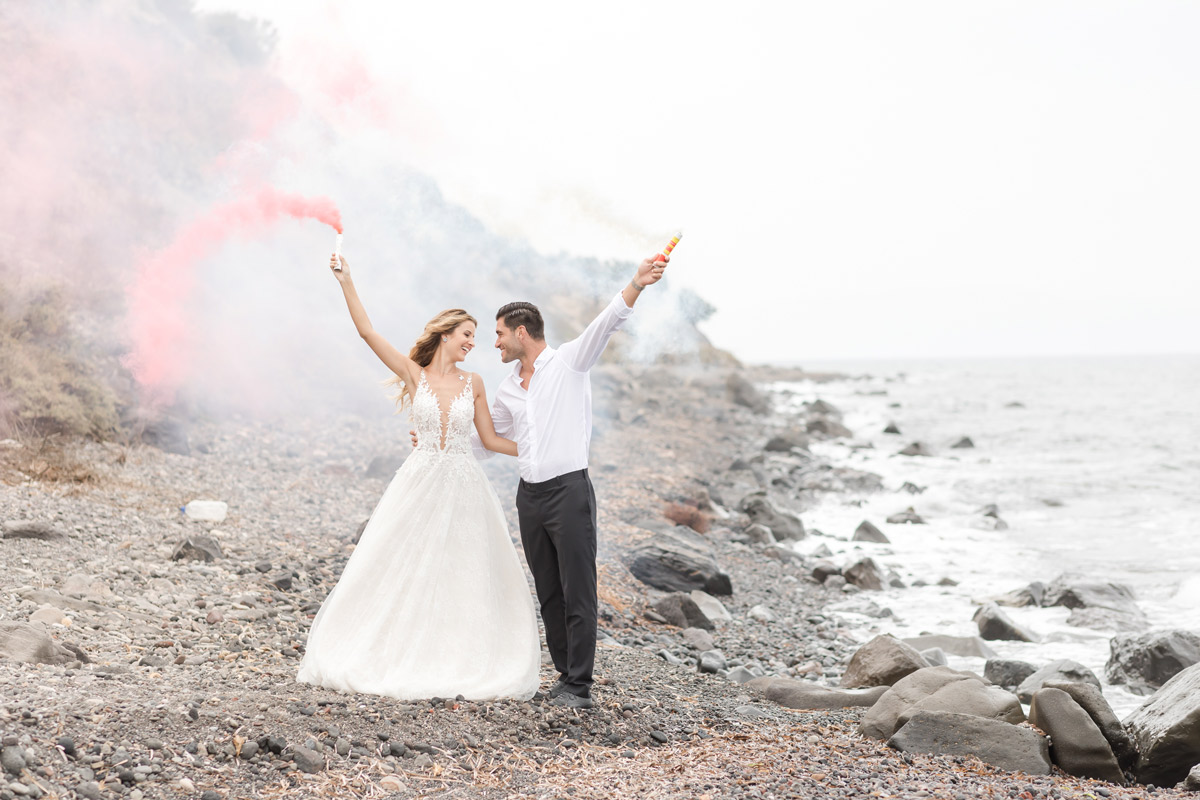 a_silver_crescent_elopement_in_Santorini_at_the_beach.jpg